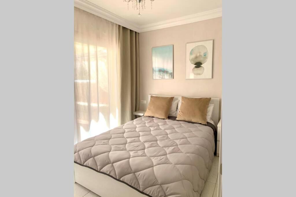 Casa Con Gran Terraza, Muy Luminosa Y En Tranquila Zona Residencial Сasa de vacaciones *