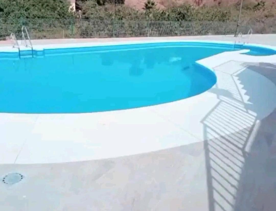 Agradable Adosado En *